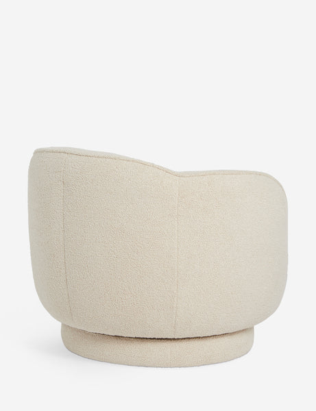 #color::teddy-boucle | Side view of the Fern scalloped back boucle upholstered swivel chair