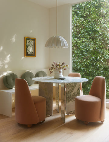 #color::blush-performance-velvet | Dining room featuring the Judson modern round velvet dining chairs.