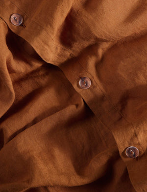 Close up view of the Essie soft, breathable hemp duvet cover in rust umber