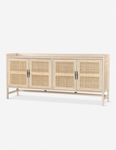 #color::natural | Angled view of the Philene natural mango wood sideboard with cane doors 