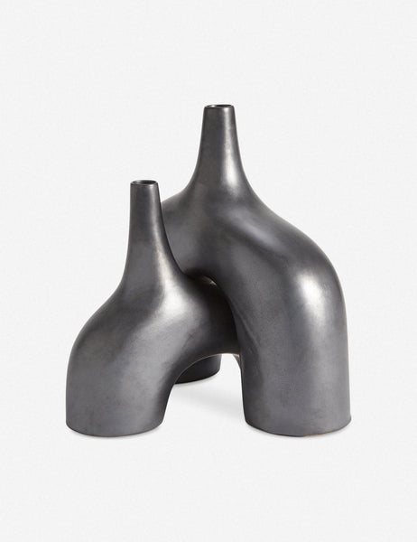 #color::black #size::small | The Leonor sculptural arched shiny black ceramic Vases in their small and large sizes nested into one another