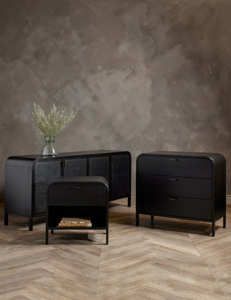 #color::black | The Brooke one drawer black nightstand sits in a studio room with the Brooke 3-drawer dress and Brooke sideboard