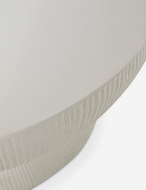 Close up of the Dominic round fluted drum outdoor coffee table.