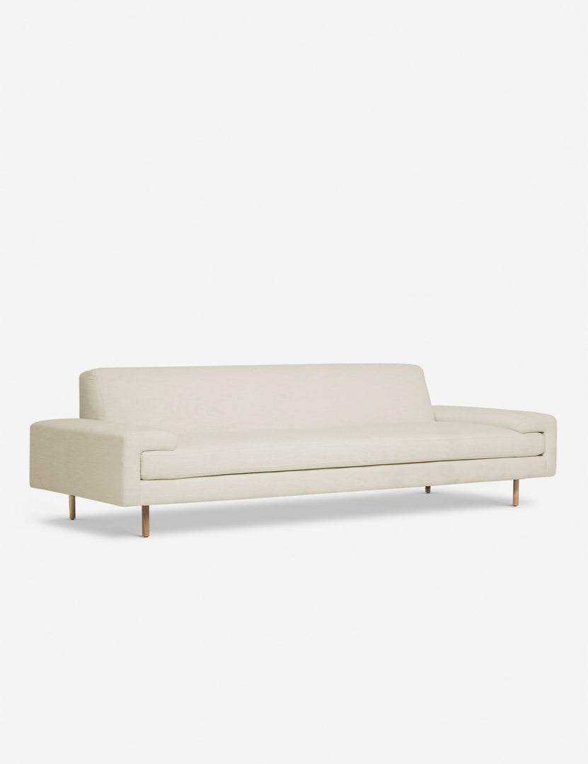 #color::natural #size::72-W #size::84-W #size::96-W #size::108-W | Angled view of the Estee natural linen upholstered sofa