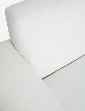 Inner corner of the Estee white linen upholstered sofa
