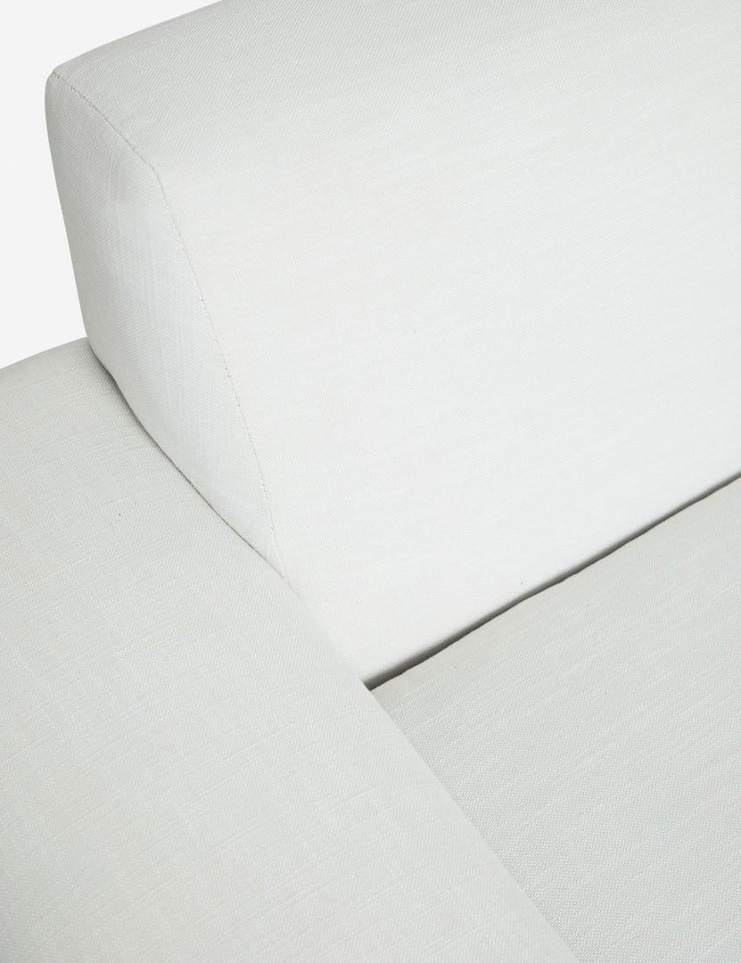 #color::white #size::72-W #size::84-W #size::96-W #size::108-W | Inner corner of the Estee white linen upholstered sofa 