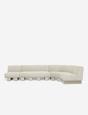 Lena right-facing white boucle sectional sofa with upholstered beam legs.