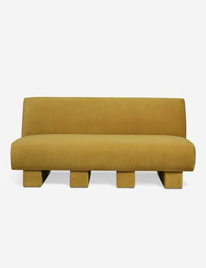 Centerpiece of the Lena yellow velvet sectional sofa with upholstered beam legs