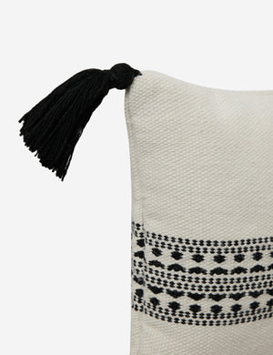 Tasseled corners on the Marchesa natural and black indoor and outdoor pillow