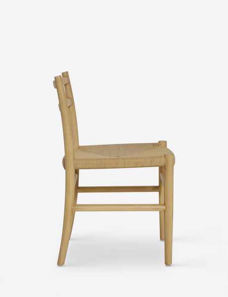 #color::natural-oak | Side view of the Nicholson slim natural oak wood frame and woven seat dining chair.
