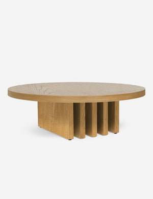 Pentwater natural wooden Round Coffee Table by Sarah Sherman Samuel with thick slab-style legs