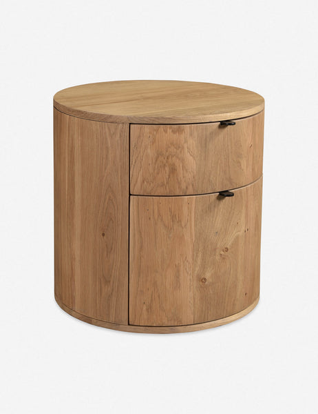 #color::natural | Angled view of the Kono 2-drawer round oak nightstand.