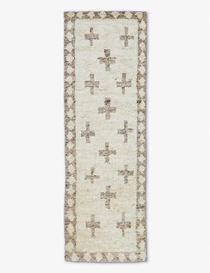 Acoma cream and tan plus-sign patterned Moroccan runner rug with diamond border.