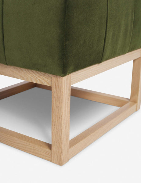 #color::jade | Close up of the airy wooden frame on the bottom of the Grasmere Jade Green Velvet Ottoman