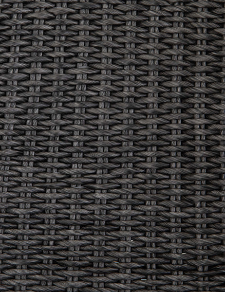 #color::Vintage-Coal  | Detailed shot of the black woven wicker on the Manila wicker weave black indoor and outdoor dining chair