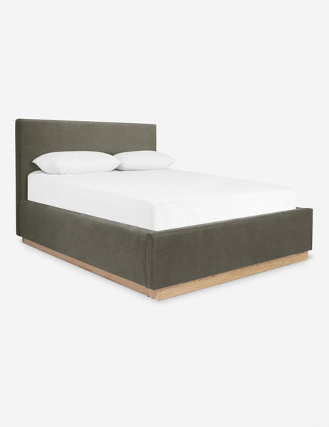 #color::loden #size::cal-king #size::king #size::queen | An angled side view of the Lockwood gray velvet-upholstered bed with a white oak base.