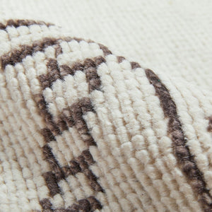 Close-up of the Zehra hand-knotted ivory, gray and purple medallion wool-blend area rug