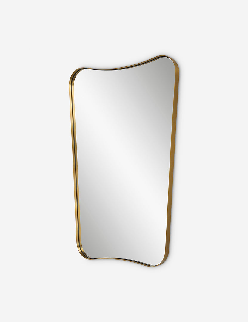 #color::gold | Angled view of the Belvoir thin brass framed wall mirror