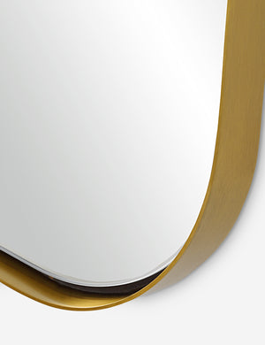 Close up view of the Belvoir metal framed full length mirror in gold