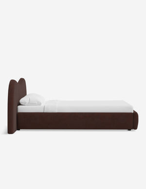 Side view of the Gladys extended headboard upholstered platform bed in wine corduroy