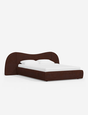 Angled view of the Gladys extended headboard upholstered platform bed in wine corduroy