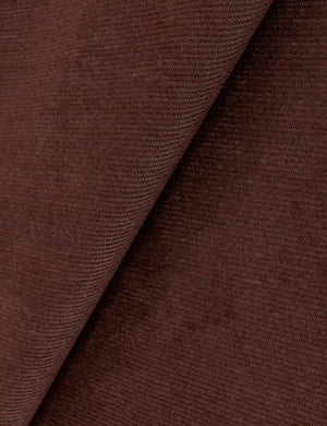 Close up view of the Gladys extended headboard upholstered platform bed in wine corduroy