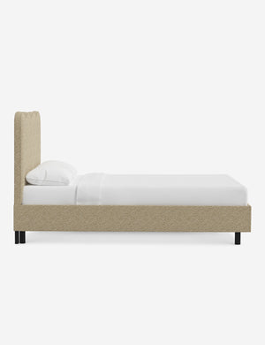 Side view of Clementine buff boucle platform bed with undulating lined headboard