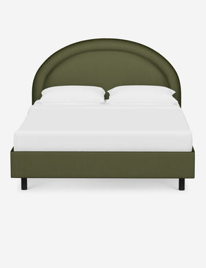 Odele Pine Green Velvet upholstered bed with an arched headboard that has a welted border