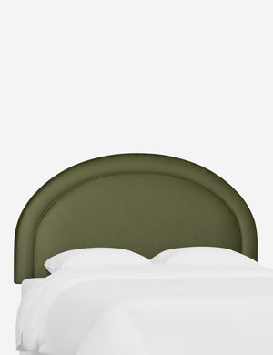 Angled view of the Odele Pine Green Velvet arched headboard