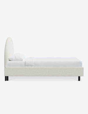 Side of the Odele Cream Sherpa bed