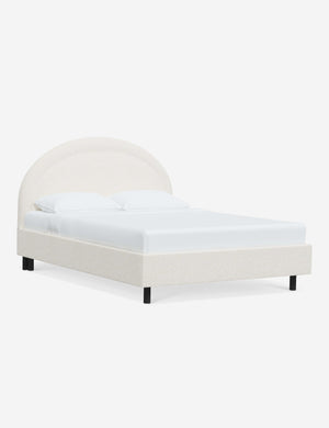 Angled view of the Odele Cream Sherpa bed
