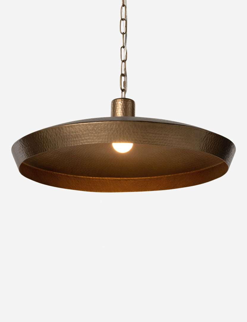 #color::brass #size::26-dia | Kamlyn shallow hammered metal dome pendant light in brass with light on.