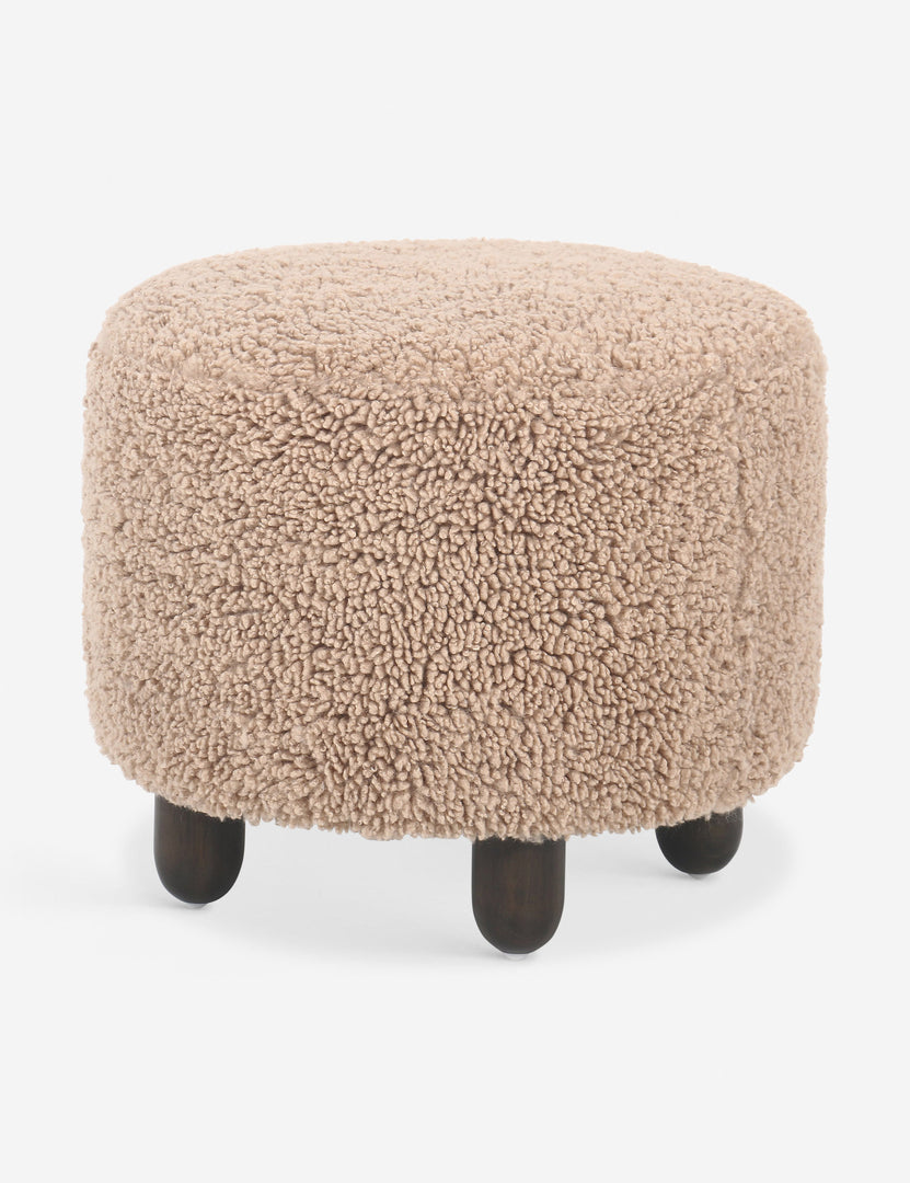 #color::toast-shearling | Side view of the Dover faux shearline round ottoman.