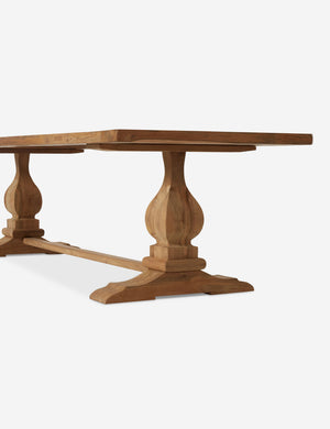 Angled view of the base of the Oveido reclaimed teak outdoor dining table.