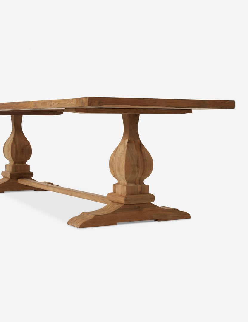 #color::natural | Angled view of the base of the Oveido reclaimed teak outdoor dining table.