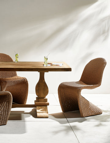#color::natural | Oveido reclaimed teak outdoor dining table styled with rattan outdoor dining chairs.