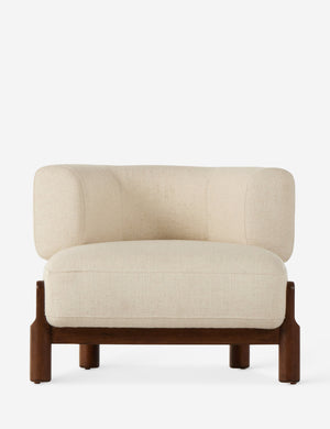 Furst sculptural upholstered barrel back accent chair in ivory.