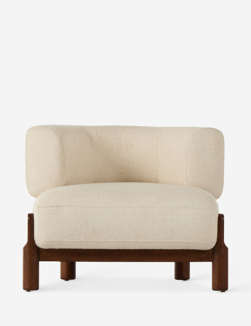 #color::ivory | Furst sculptural upholstered barrel back accent chair in ivory.