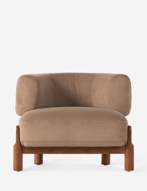 Furst sculptural upholstered barrel back accent chair in taupe velvet.