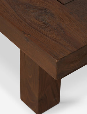 Close up of the Kirkman solid teak rustic wood outdoor coffee table.