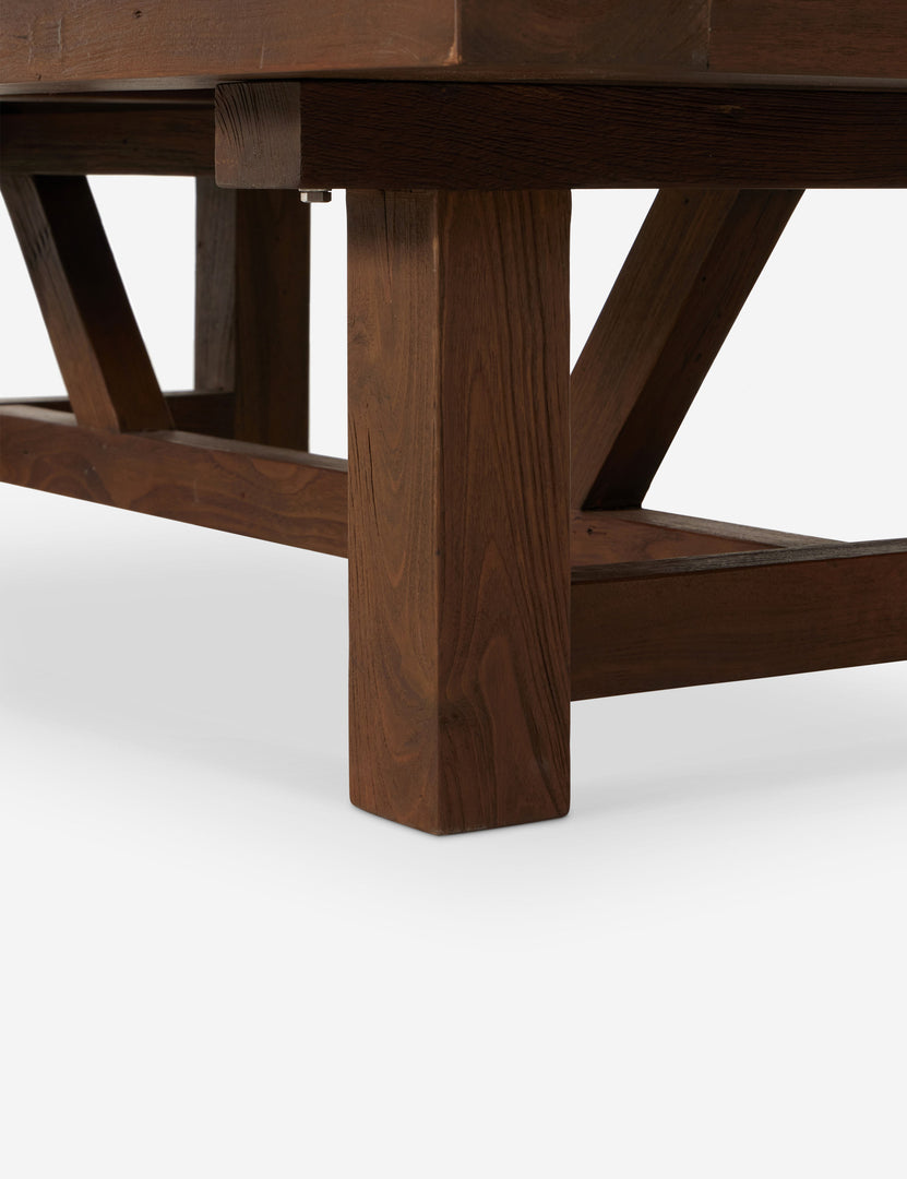 | Close up of the leg of the Kirkman solid teak rustic wood outdoor coffee table.