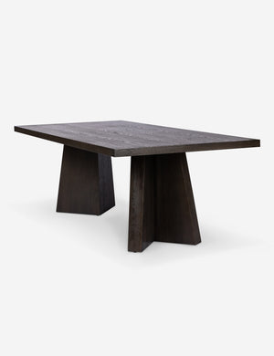 Angled view of the Hallen angular leg sculptural dining table.