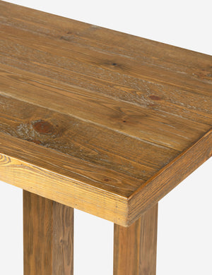 Close up view of the Hayman honey finish solid wood console table.