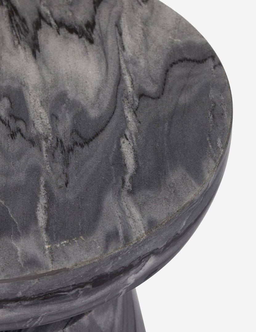#color::gray-marble | Close up view of the Zeller round carved ebony marble side table.