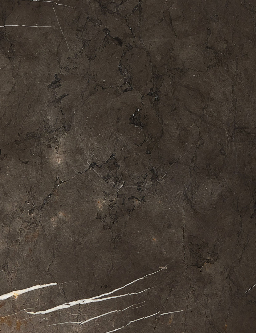 #color::brown-marble | Close up of the stone of the Kozak round marble pedestal side table.
