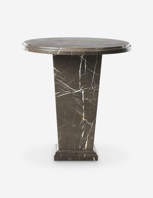 Kozak round marble pedestal side table.