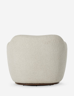 Back of the Selkie modern barrel swivel chair in ivory boucle.