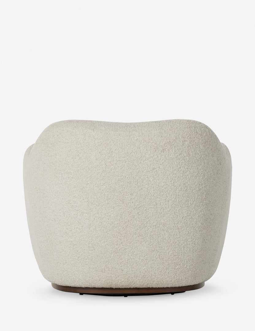 #color::ivory-boucle | Back of the Selkie modern barrel swivel chair in ivory boucle.