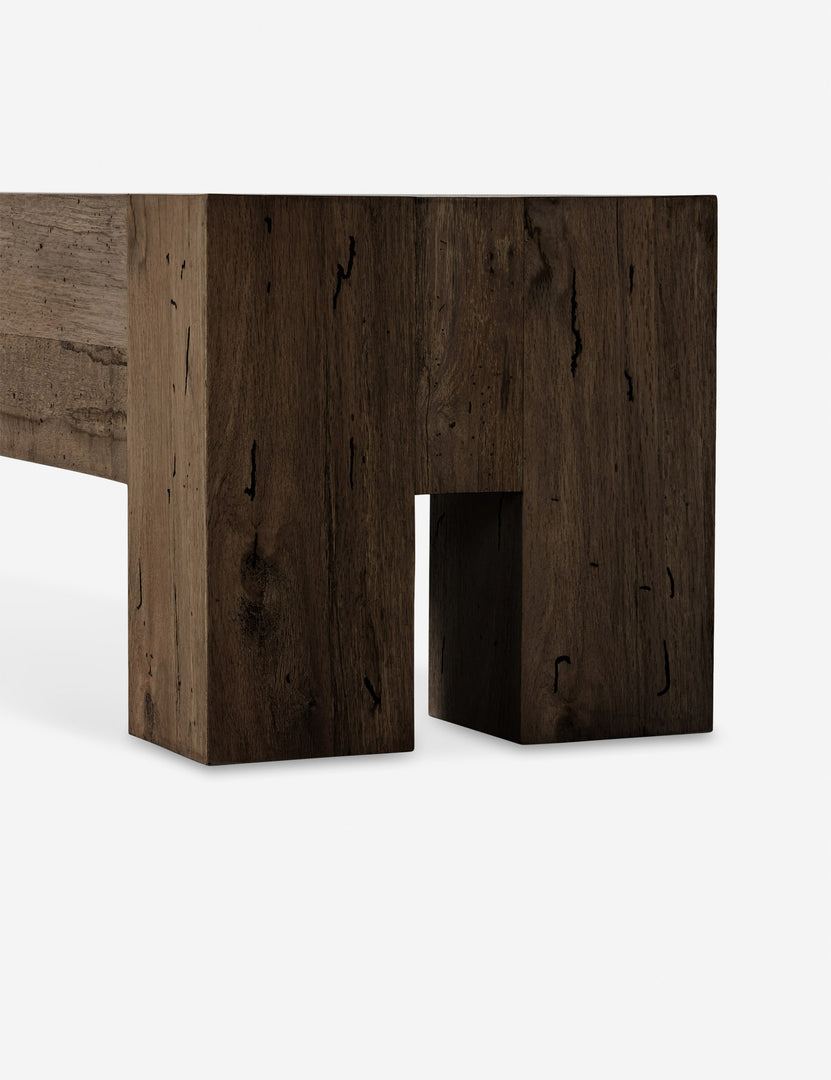 #color::brown | Close up view of the legs of the Bevan chunky leg distressed wood bench in brown.