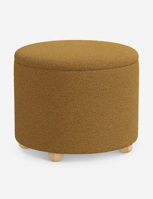 Angled view of the Kamila Ochre Boucle 24-inch ottoman